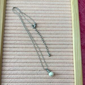 Vintage Silver and White Necklace with Minimalist Design